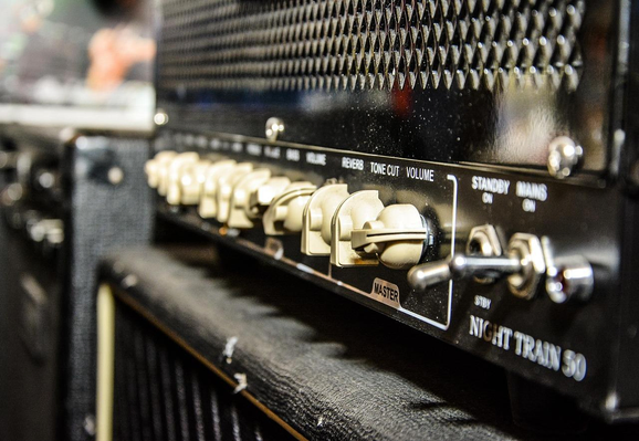 Closeup of a guitar amplifier. Image by microart1 from Pixabay